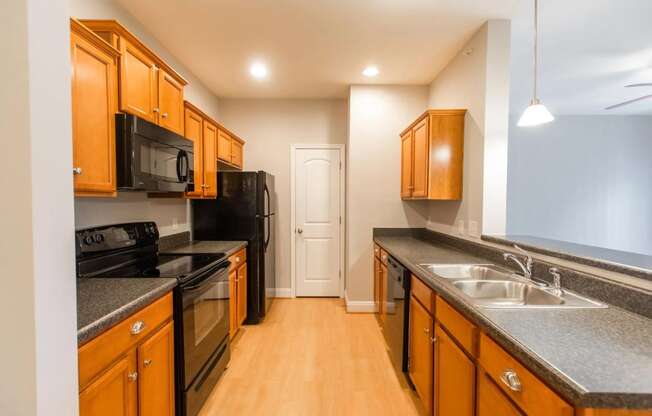 Kitchen view with all appliances  at Huntington Apartments, Morrisville, 27560  and natural light