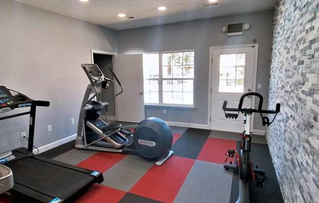 apartment community gym at the landing apartments