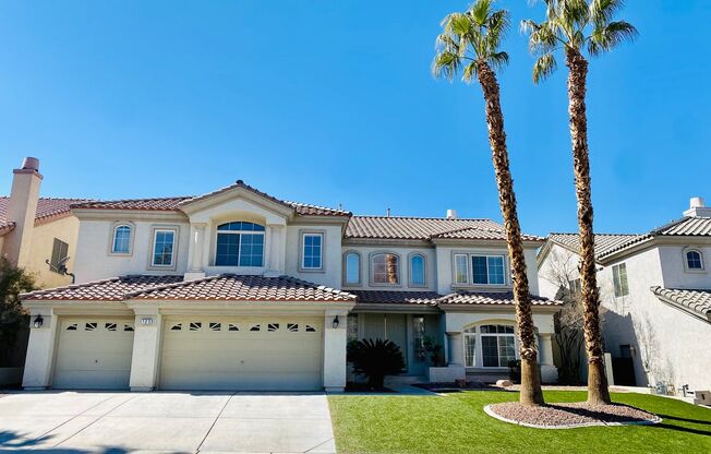 Stunning home in a guard gated community inside Rhodes Ranch with tons of community amenities. Almost 5,000 sq ft home with 3-car garage, 4 bedrooms with 4.5 bathrooms. Huge loft upstairs.