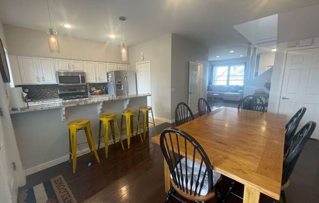 LOCATION!  Newer contemporary townhome 2 bed w/office space in Denver's desirable Berkeley neighborhood across from lake & park!
