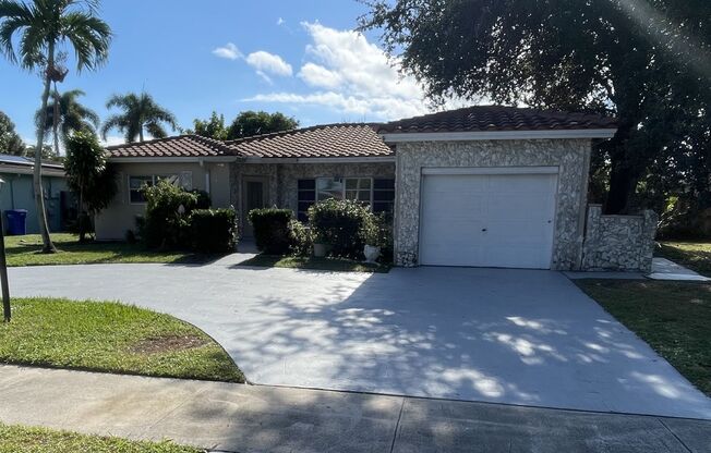 Renovated 3 bedroom, 2 bath, Single Family home with 1 car garage and fenced in back yard in Margate.