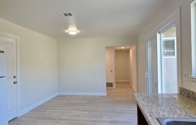 Renovated and Remodeled, New Driveway, New Yard, Kitchen and Bathrooms, Fresh Paint, Wood Floors!