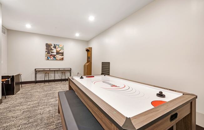 a game room with a ping pong table