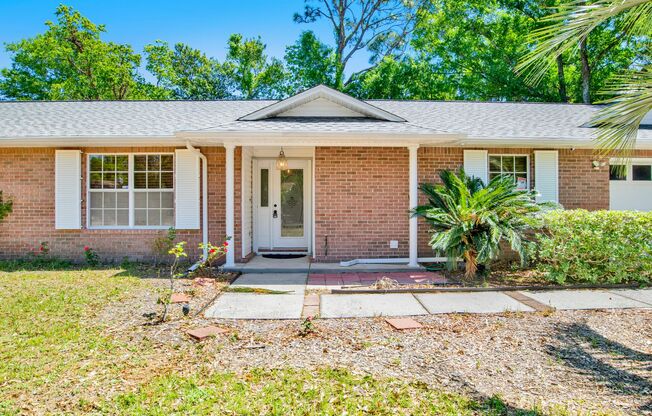 Well-Maintained Home with 2-Car Garage & Screened Back Porch in Central Location