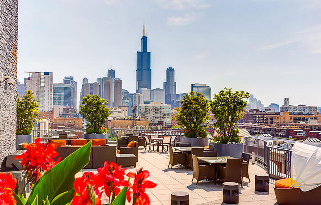 Rooftop lounge area with Chicago skyline views at The Madison at Racine, Chicago, IL