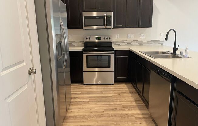 3 Bedroom Townhome w/FULLY FENCED YARD & GARAGE!!