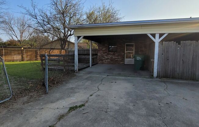 3 Bedroom and 2 Bath Duplex with Carport and Fenced Back Yard