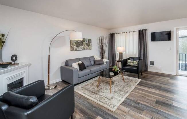 Living Room with Wood-Inspired Flooring | Bend OR Apartments | Sienna Pointe