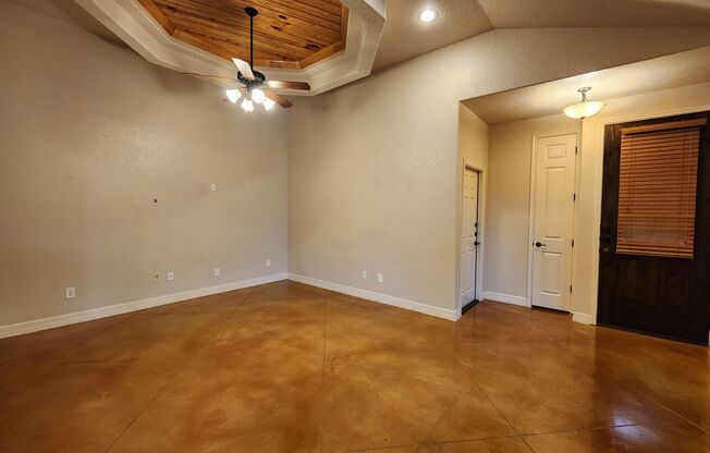 Stained Concrete Floors / Side by Side Fridge Included / Covered Patio / Fenced in Yard / CISD