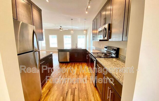 311 W 13 ST 309 W