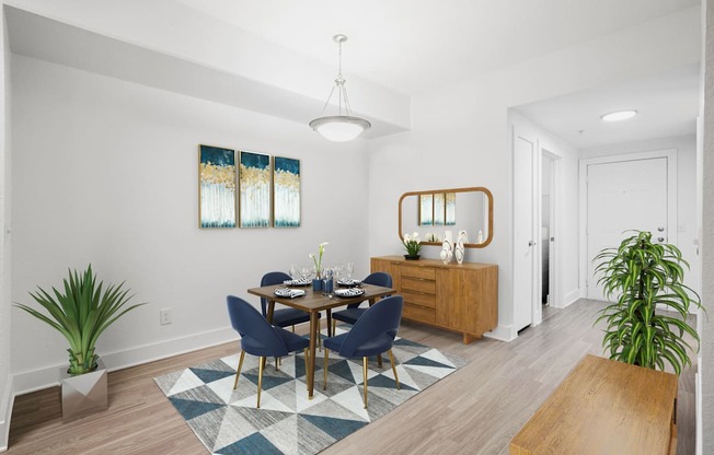 A dining room with a set of chairs and a table