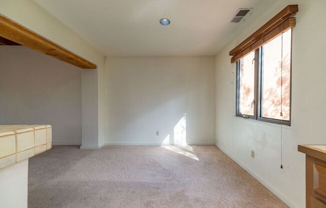 Two Story Condo Just off Old Taos Highway Available Now!