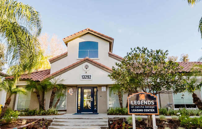 A house with a sign that says Legends Leasing Center.