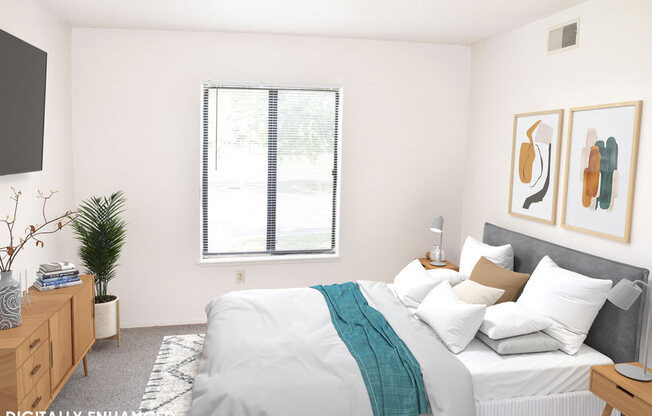 Bedroom with a window in it at Seville Apartments in Kalamazoo, MI 49009