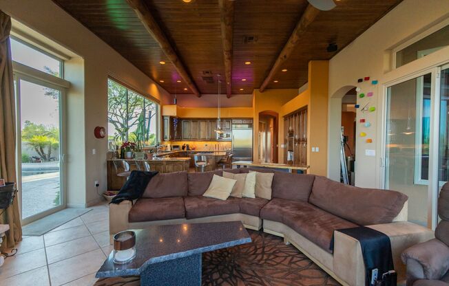 CUSTOM ESTATE ON HUGE LOT WITH PRIVACY AND PANORAMIC MOUNTAIN VIEWS SPARKLING POOL AND HUGE GARAGE