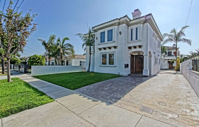 SPACIOUS & BRIGHT, TWO-STORY HOME W/ FRONT YARD, BALCONY & 2-CAR GARAGE CLOSE TO SHOPPING, FREEWAY ACCESS, RB BORDER & MINS TO BEACH!
