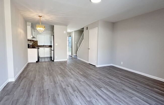 Move-in ready Evergreen townhome with private backyard, detached 2-car garage, and great community amenities