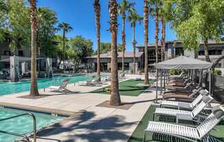 poolside lounging areas at Avora apartments