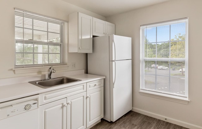 Orchards Apartments Marlborough ma apartment loft style apartments photo of kitchen with white appliances and white cabinets with wood floors and large window