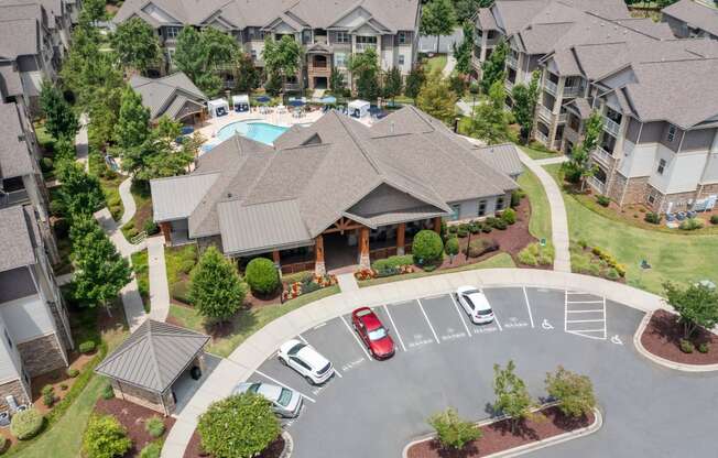 a large house with a swimming pool in front of it