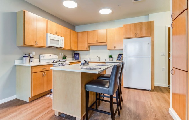 Fully Equipped Kitchens And Dining at The Legends at Berry 62+ Apartments, Minnesota 55114