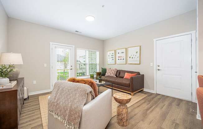 a living room with two couches and a table