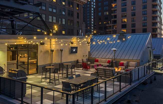 Rooftop Patio with fire pit and big screen TV