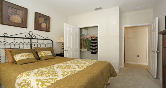 Guest bedroom with ample closet space at The Columns at Bear Creek, New Port Richey, Florida 34654