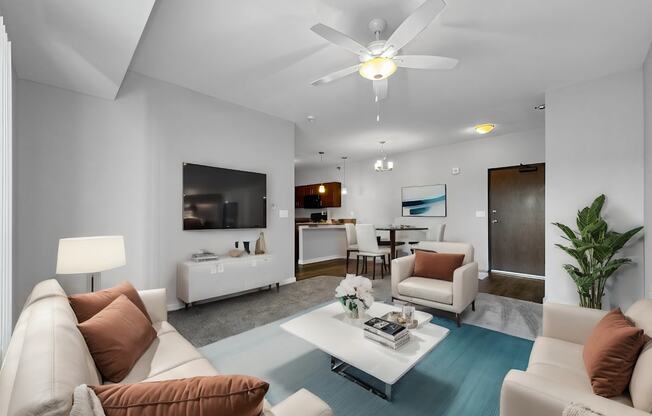 a living room with couches and a coffee table