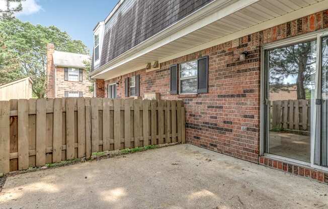 Fenced outdoor patio at Ashley Pointe Apartments