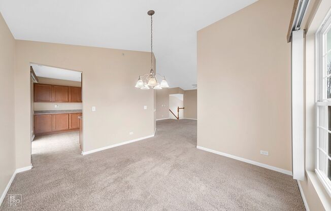 AUTUMN CREEK SECOND FLOOR CONDO WITH TWO CAR GARAGE