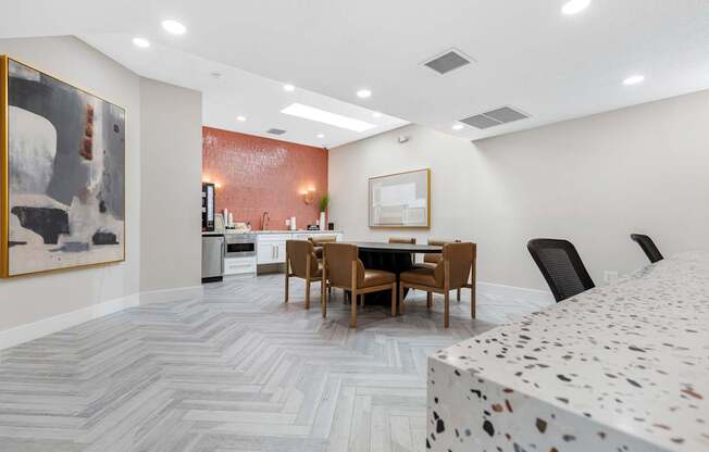 A dining room with a table set for six.