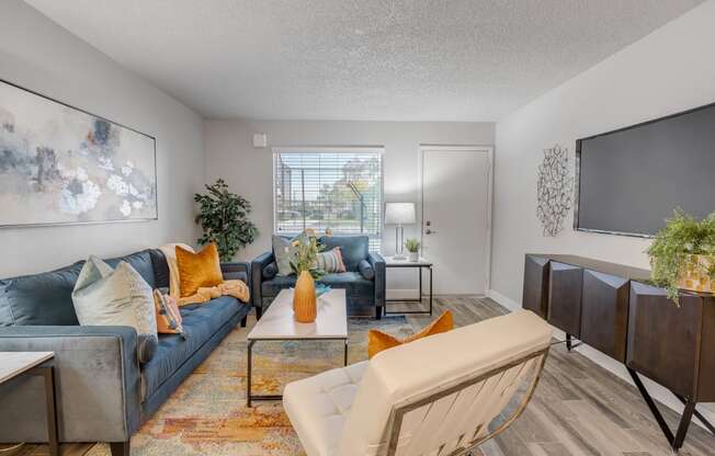 Phoenix Apartments - Spacious Open Concept Living Room With Beautiful Wood Floors