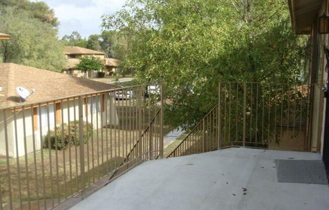 2 BEDROOM 1 BATH UPSTIARS UNIT WITH BALCONY FRONT AND BACK