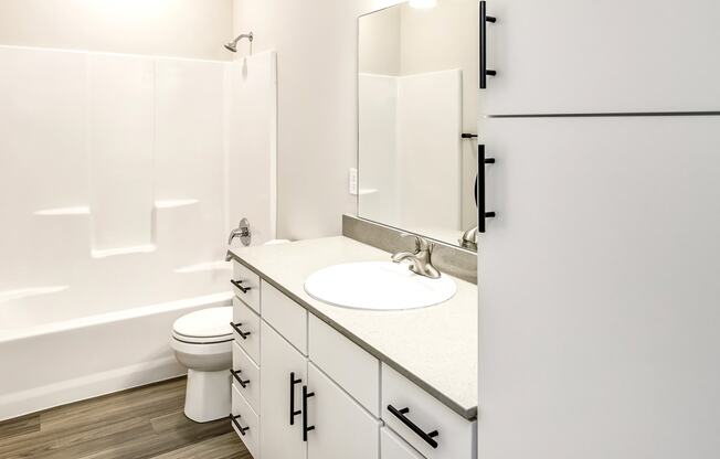 Studio, one two and three bedroom apartments and townhomes featuring open concept floor plans, dens, large windows, stainless steel appliances, quartz countertops, eat-in kitchens, pantries, LVT flooring and much more at The Trails at North Streams in Omaha, NE