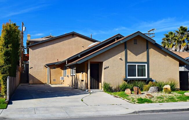 Downstairs North Park Apartment with Parking & Onsite Laundry!