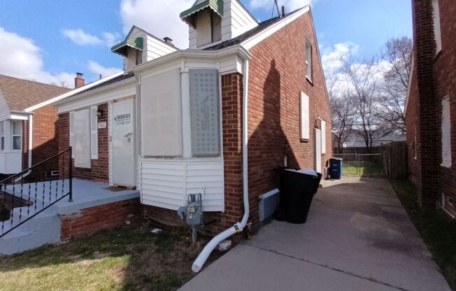 4 bed/1 bath brick home now available!