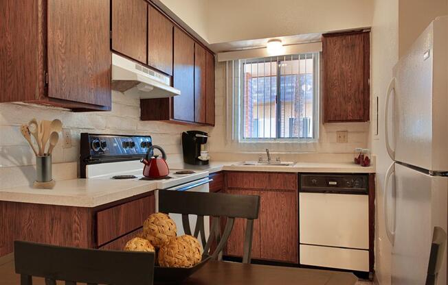 Spacious Kitchen with Pantry Cabinet at Fountain Plaza Apartments, Arizona, 85712