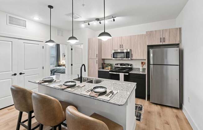 Kitchen of Model Unit at Whispering Pines in Euless, TX