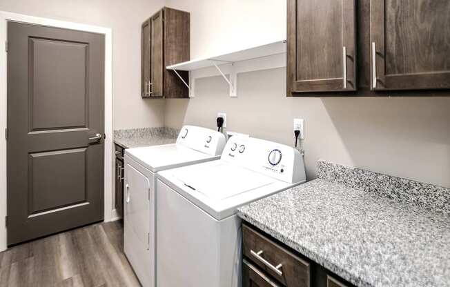 Luxury studio, one, and two bedroom apartment homes featuring granite countertops, stainless steel appliances, and fireplaces at East Lake Flats in Lincoln, NE