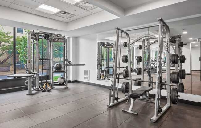 the gym is equipped with weights and cardio equipment