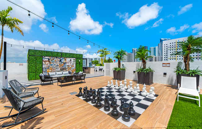 a giant chess board on the roof of a building