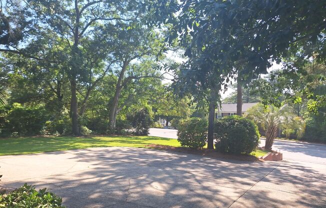 Magnificent Four Bedroom Home - Minutes Away from Numerous Attractions!