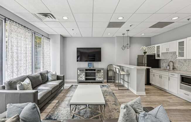 a living room with a couch and a table