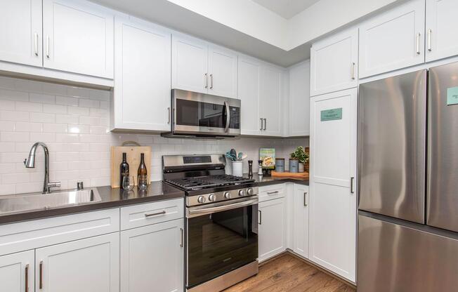 a kitchen with stainless steel appliances
