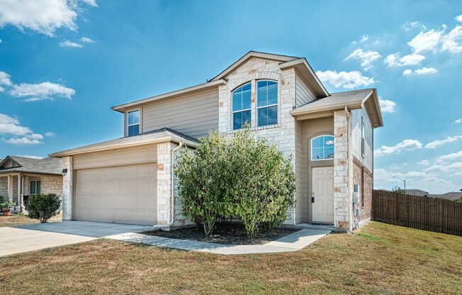 Beautiful 4/2.5/2 two story with office on oversized corner lot!
