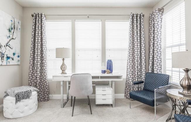 Office space perfect for working from home with large, sunny windows and plush carpeting