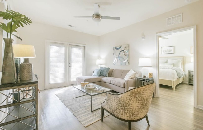 a living room with a couch and a table