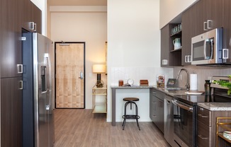 Kitchen with stainless steel appliances and modern fixtures