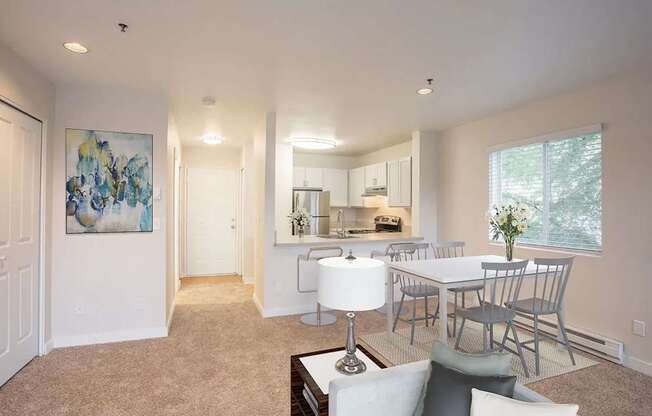 Living room with view into the kitchen